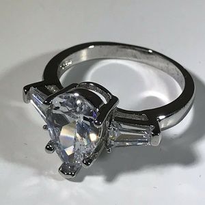Pear Cut CZ Ladies With 2 Side Stones Ring Size 7.